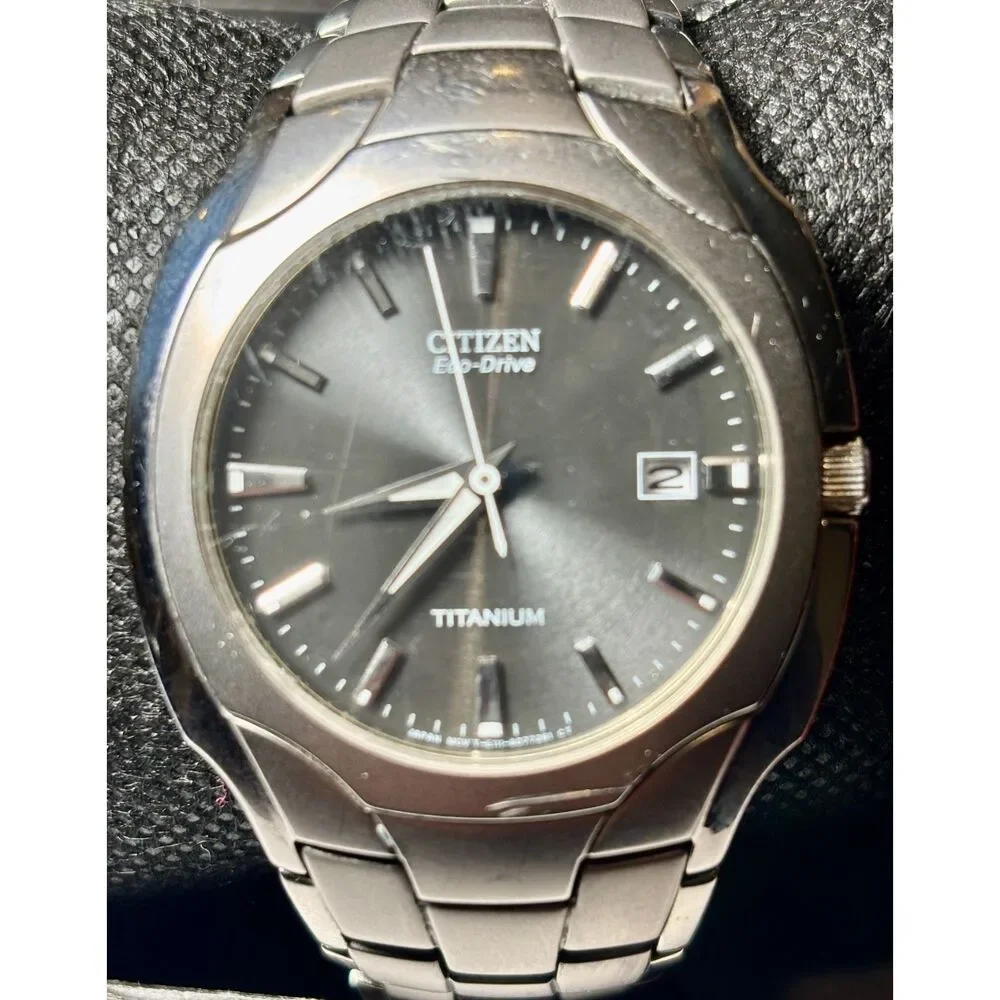 Citizen Eco-Drive Titanium Men's Watch – Black Sunburst Dial (Ref. E111-S049610)